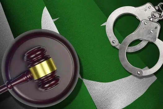 Court gavel and handcuffs representing arrest and bail law in Pakistan