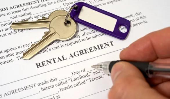 Rental agreement and keys representing tenancy rights in Pakistan